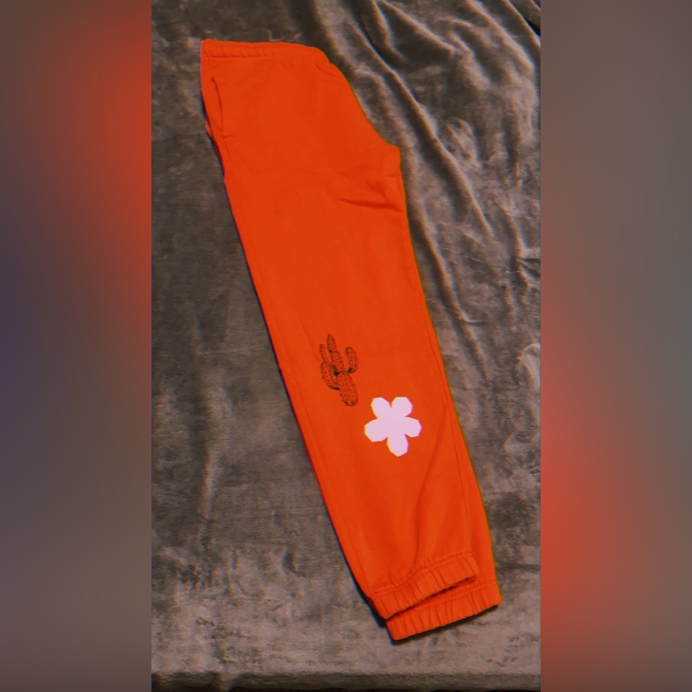 Orange ‘Lucky’ Selena Gomez joggers